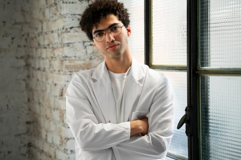 front-view-doctor-wearing-lab-coat_23-2149551157